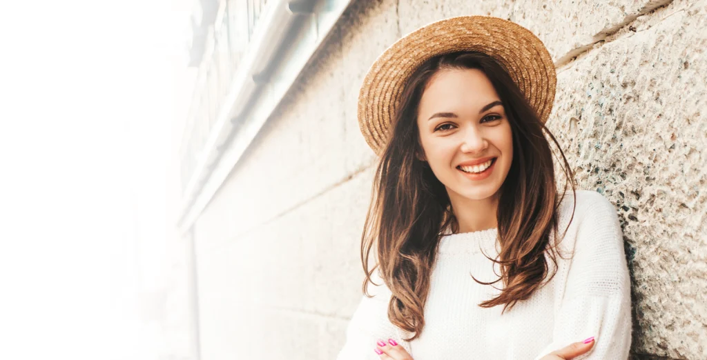 a smiling girl showing her teeth